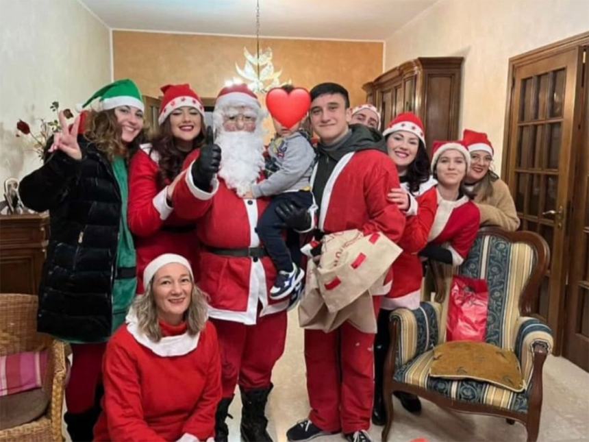 Quattro Torri di "Regali di Natale a domicilio per i bambini"